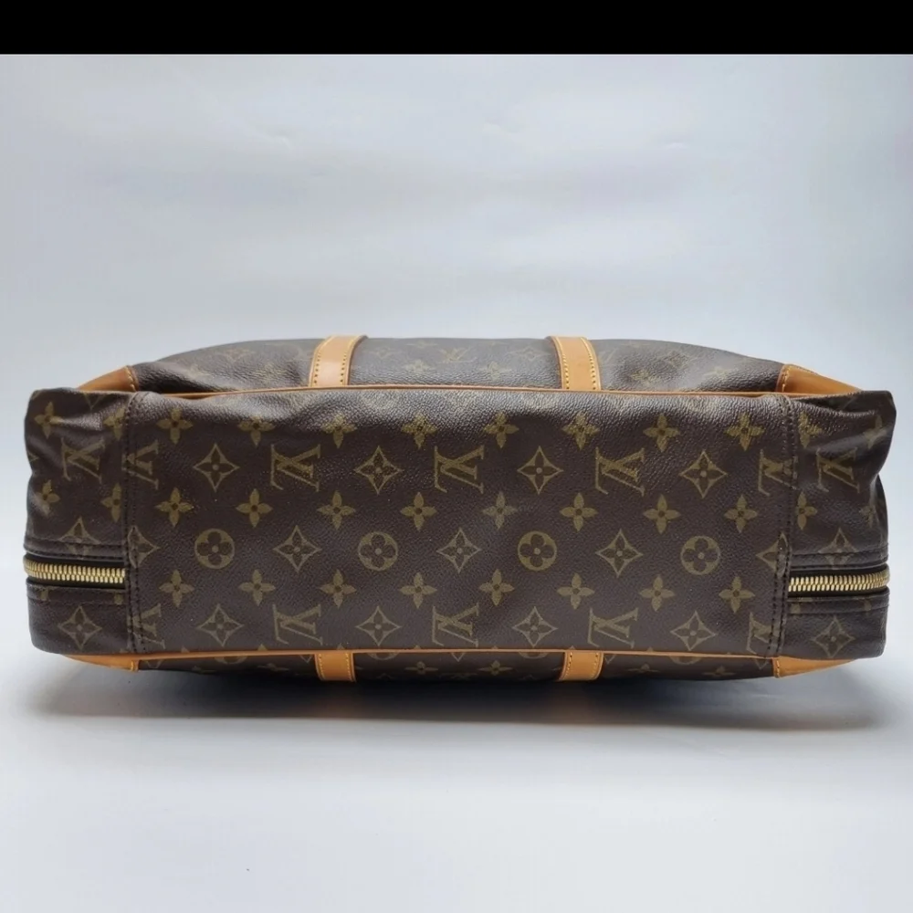 Louis Vuitton pattern suitcase
